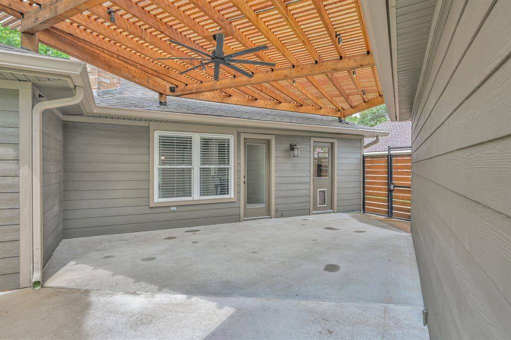 Custom-built pergola with clear cover keeps you dry even when it's raining!