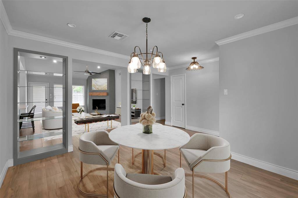 Open concept floor plan offers sleek, contemporary finishes mixed with upscale charm throughout. *photo is virtually staged.
