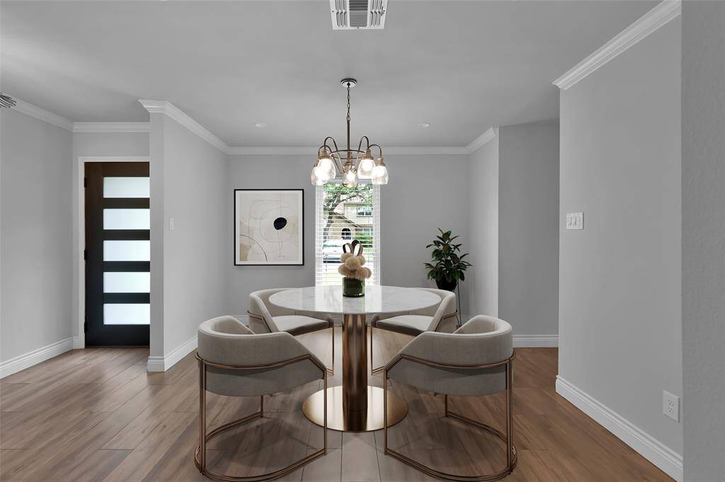 Formal dining room with plenty of space to host family and friends. *photo is virtually staged.