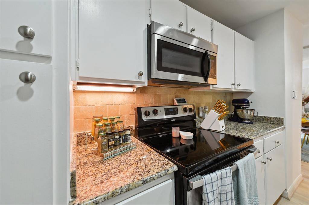 Kitchen, microwave, electric stove range