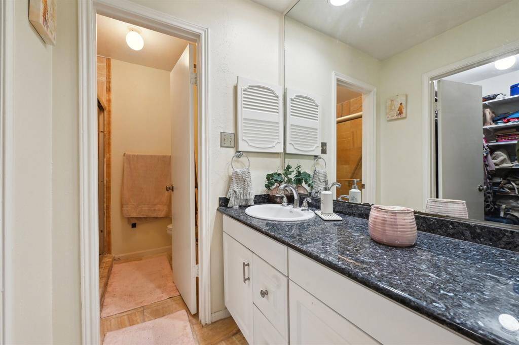 Primary Bathroom beautiful granite counter tops