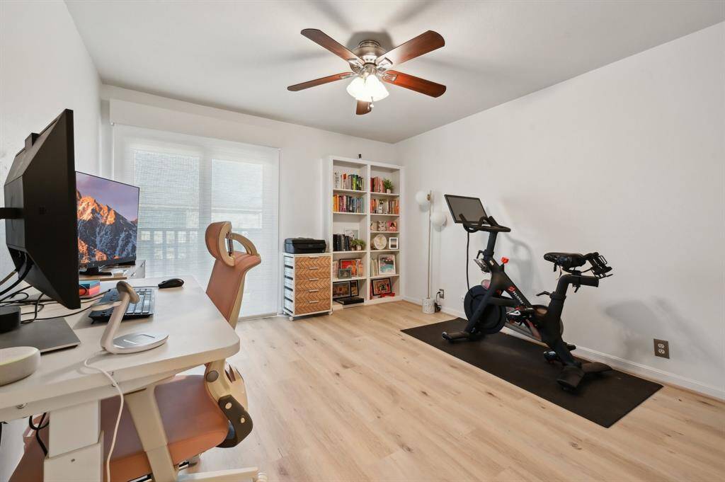 Secondary Bedroom-walk out into your balcony through your soundproof sliding doors that overlooks the Briar Club, with motorized solar shades