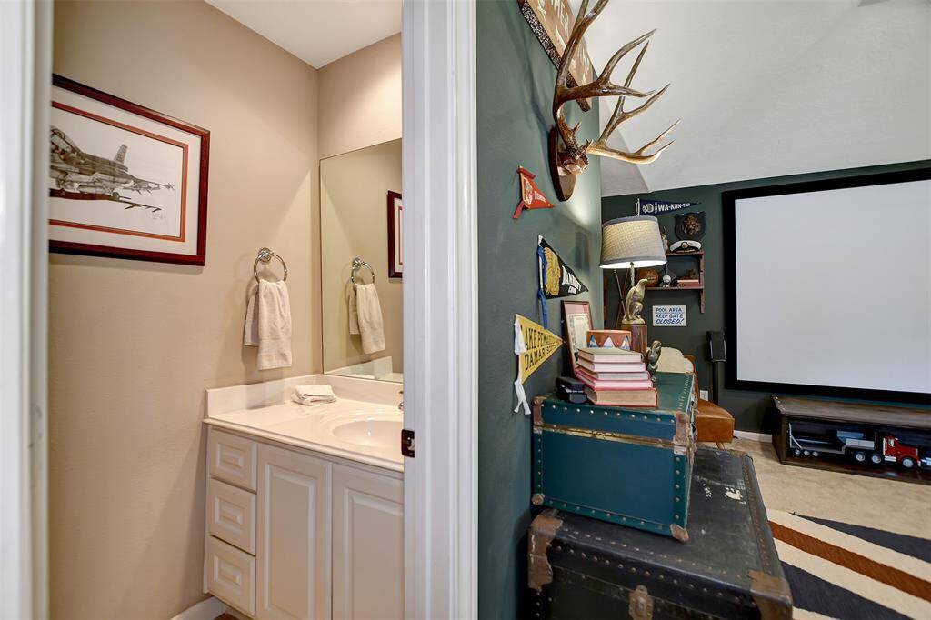 A convenient half bathroom is also located upstairs for added functionality.