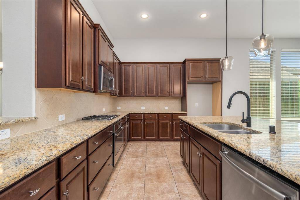 Virtually altered cabinet color to show how the kitchen looks with painted cabinets!