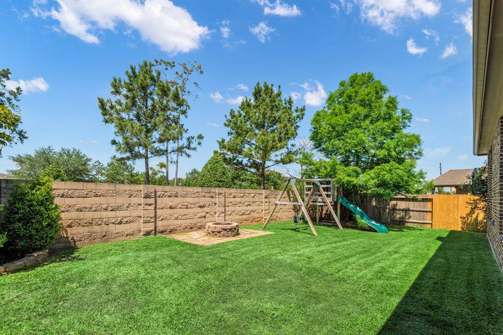 Nice shaded covered patio off the kitchen