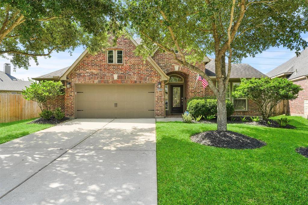 The curb appeal is stunning on this all brick Perry home!
