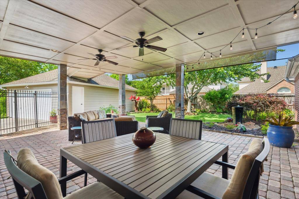 Everyone is going to have patio envy when they come see our wonderful outdoor space! You have room to eat and to sit around and visit or read a book. It's shady and the view of the yard is superb.