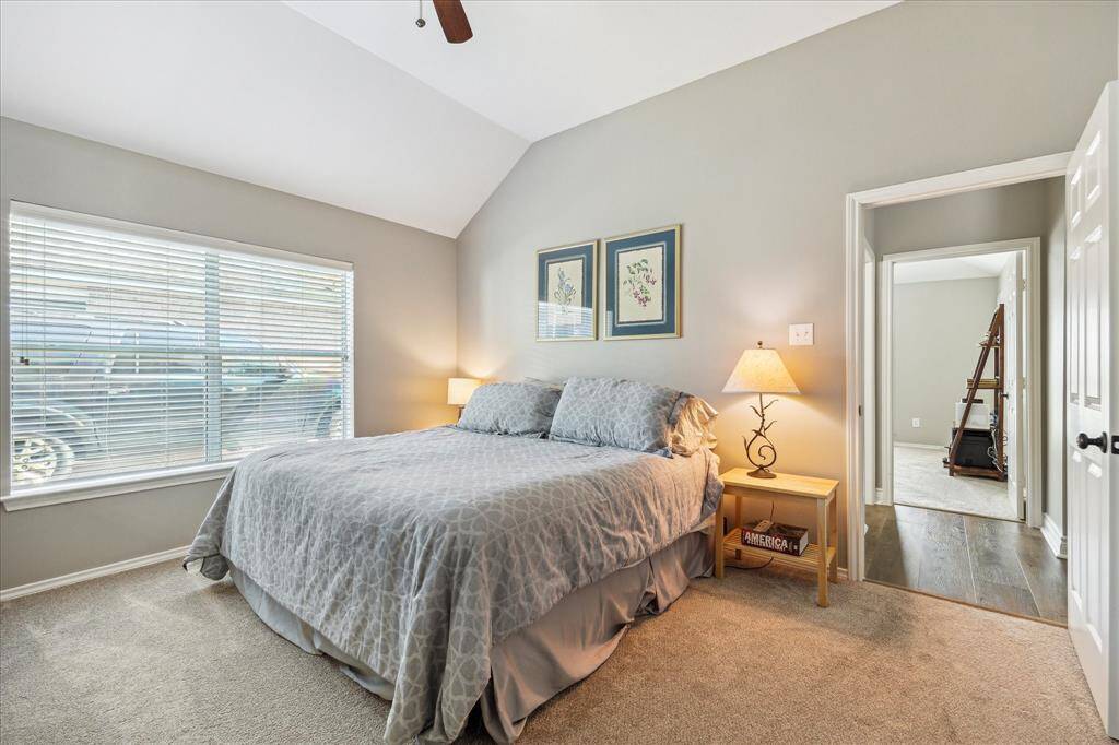 There's a hall bath on the other side of the wall the bed is against. You can see the front bedroom too.