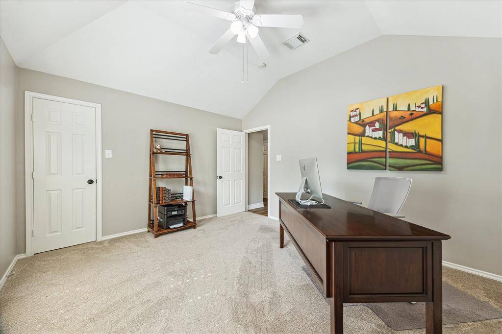 The walk-in closet is through the door to the left. The laundry room is just around the corner. The bathroom is right next door.