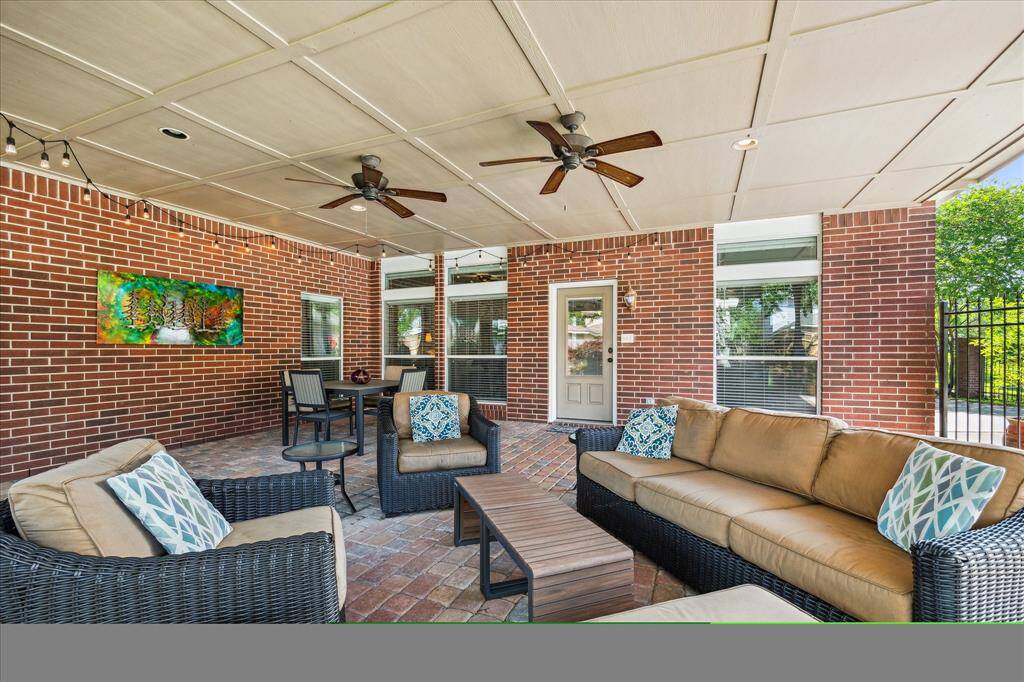 You can see the wrought iron gate along the driveway that closes off the back yard. This will be your Happy Place!