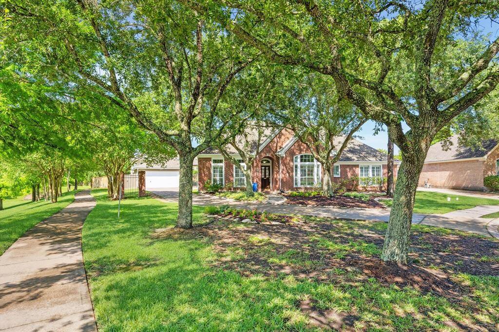 You're at the end of the cul-de-sac and there's a beautiful path just outside your fence. There's a separate wrought iron fence along the driveway (house side) that closes off the back yard in case you have pets or kids.