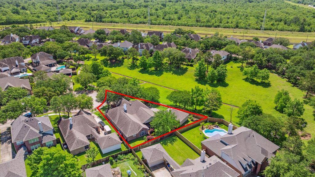 You can see the outline but it's very private because of the trees in front and back.