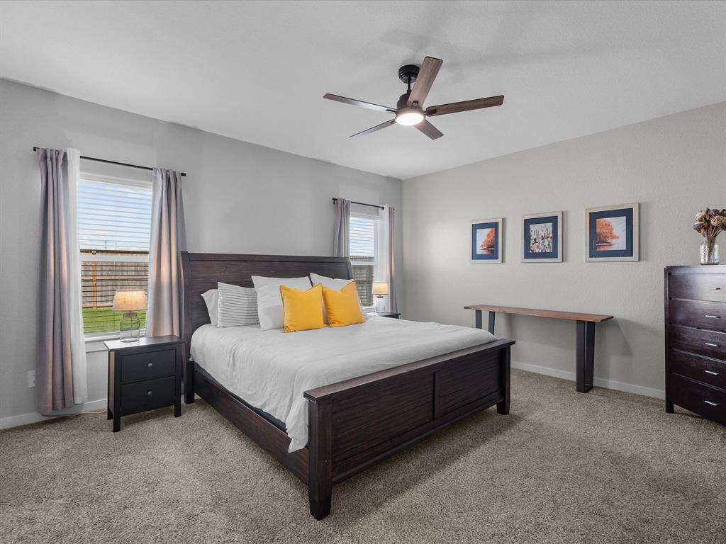 Primary bedroom located on the first floor with a private en-suite bath