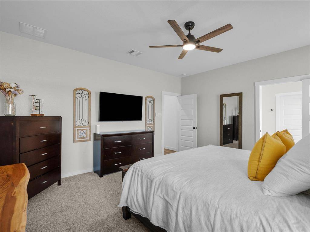 Primary bedroom located on the first floor with a private en-suite bath