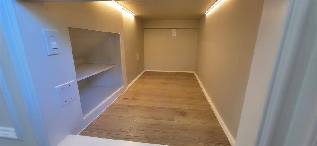 Pet room/kids reading nook under the stairs