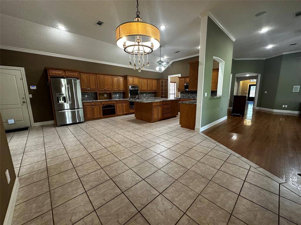 Breakfast nook to kitchen and living rooms