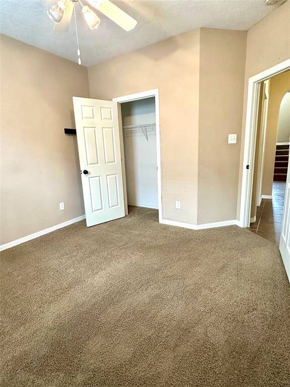 3rd bedroom with ceiling fan