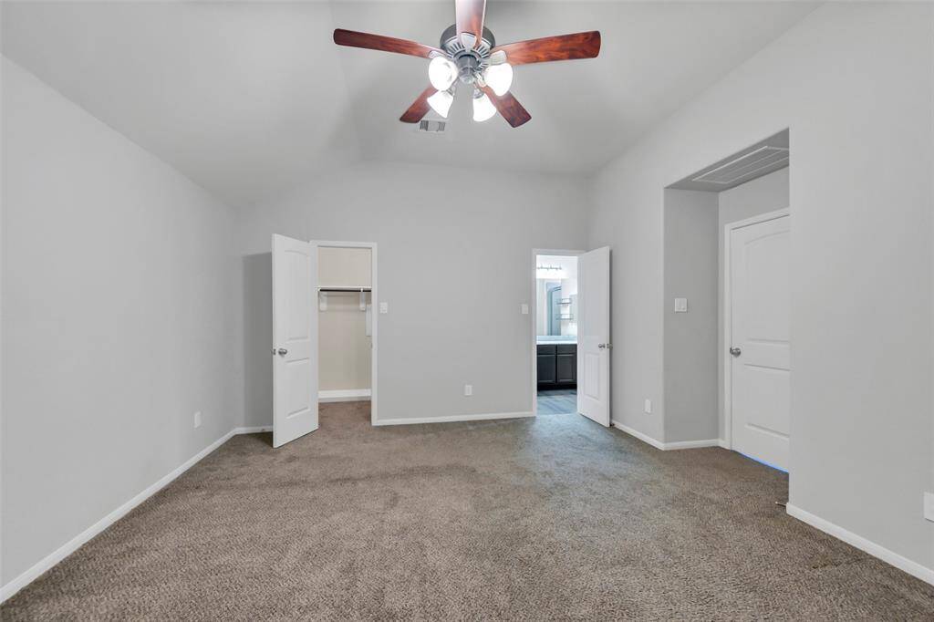 Walk-in closet access is to the Left while bathroom access is on the Right.