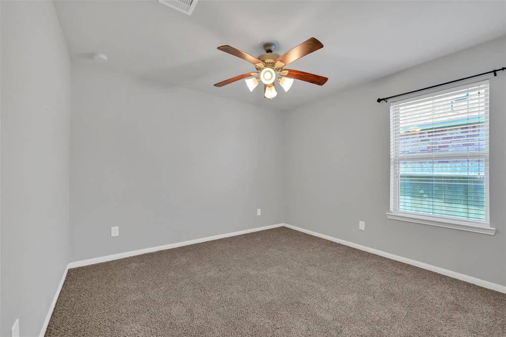 2nd bedroom. The secondary bedrooms are separate from the primary bedroom, thanks to the ideal split floor plan that this home offers.