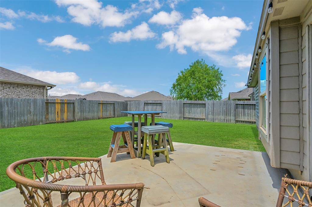 Accessed from the kitchen / dining areas is the spacious fenced backyard with a patio ready for those fun get togethers! More than enough room for your grill or smoker.