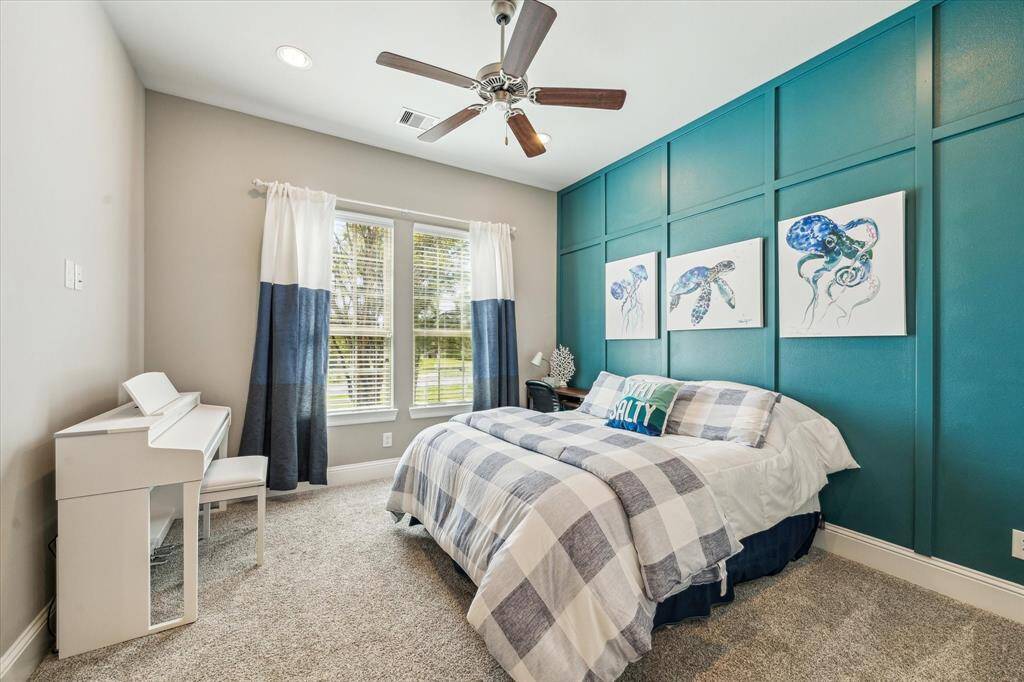 Guest bedroom located on the first floor with it's own walk in closet.