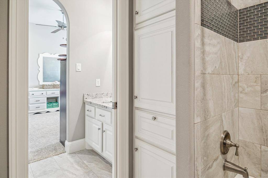 Built in storage in split bathroom.