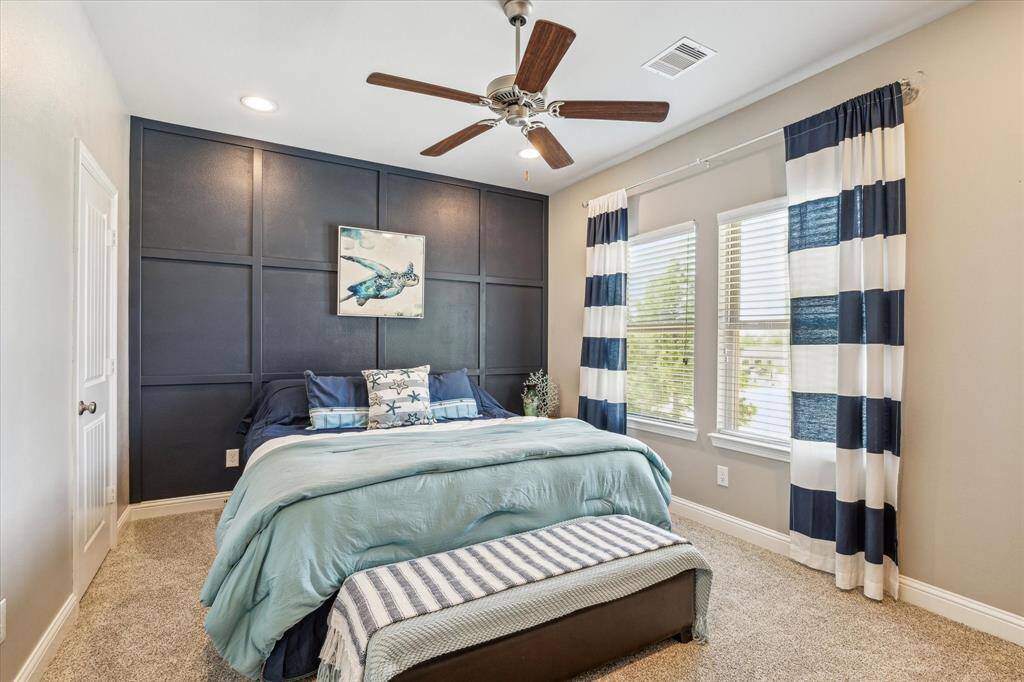 Second floor Guest Bedroom with a private bathroom and walk in closet.