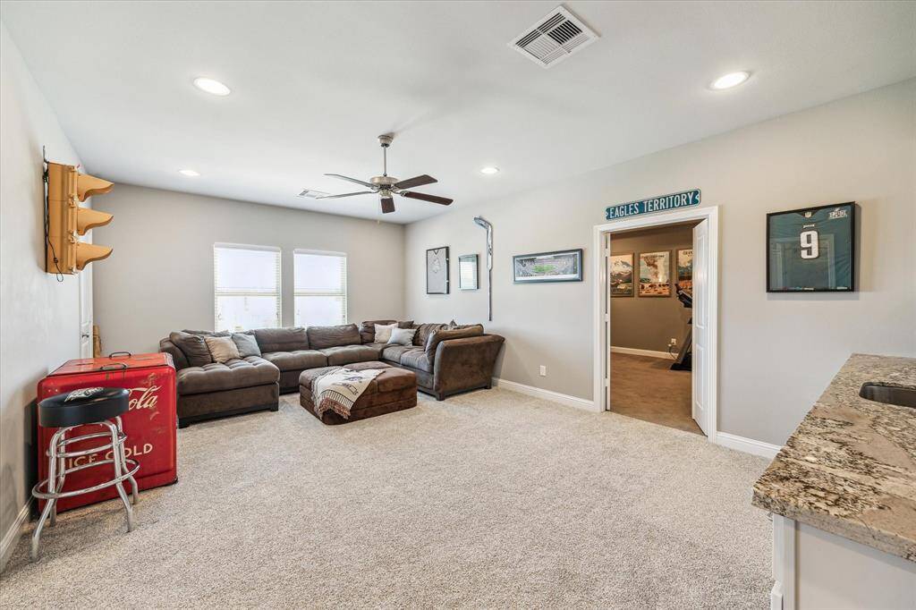 Game closet and walk out attic for tons of extra storage.