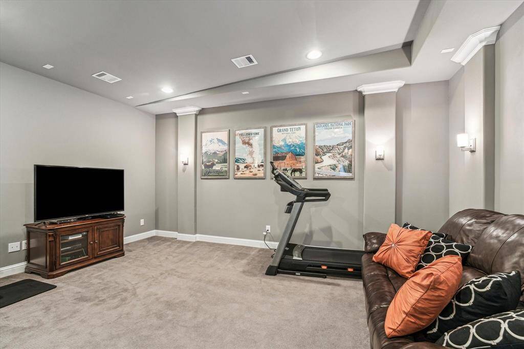 Media room currently being used as an exercise room.Wired for ceiling projector.