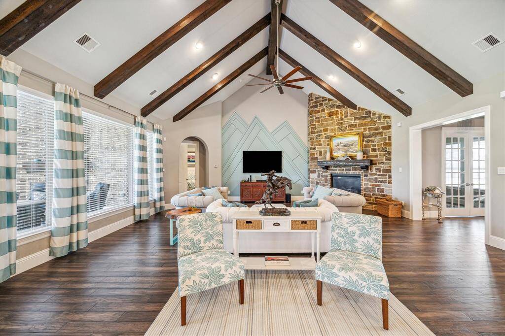 Vaulted ceiling with wood beams.