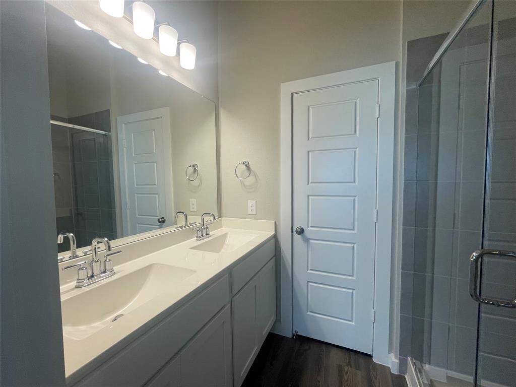 Primary Bathroom has double vanities.