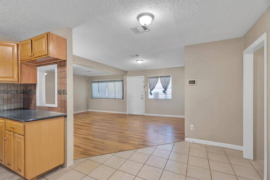 View from kitchen/breakfast area into the living area.
