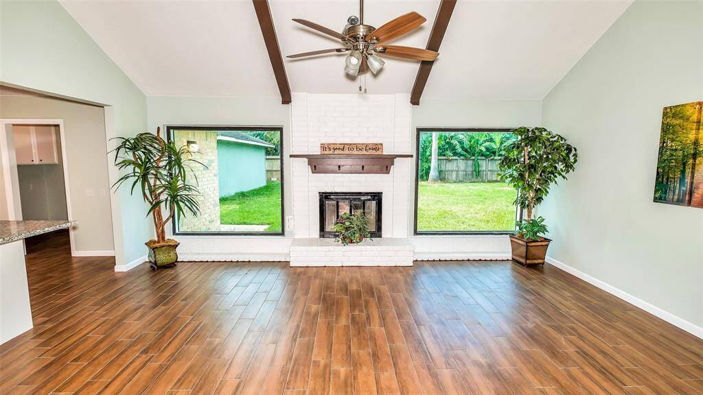 Great view of green backyard from Living room - You can watch the kids playing in back yard from anywhere.
