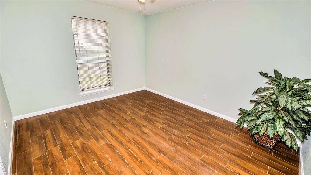 Study Room next to Dining Room with Woodlike Tile floors