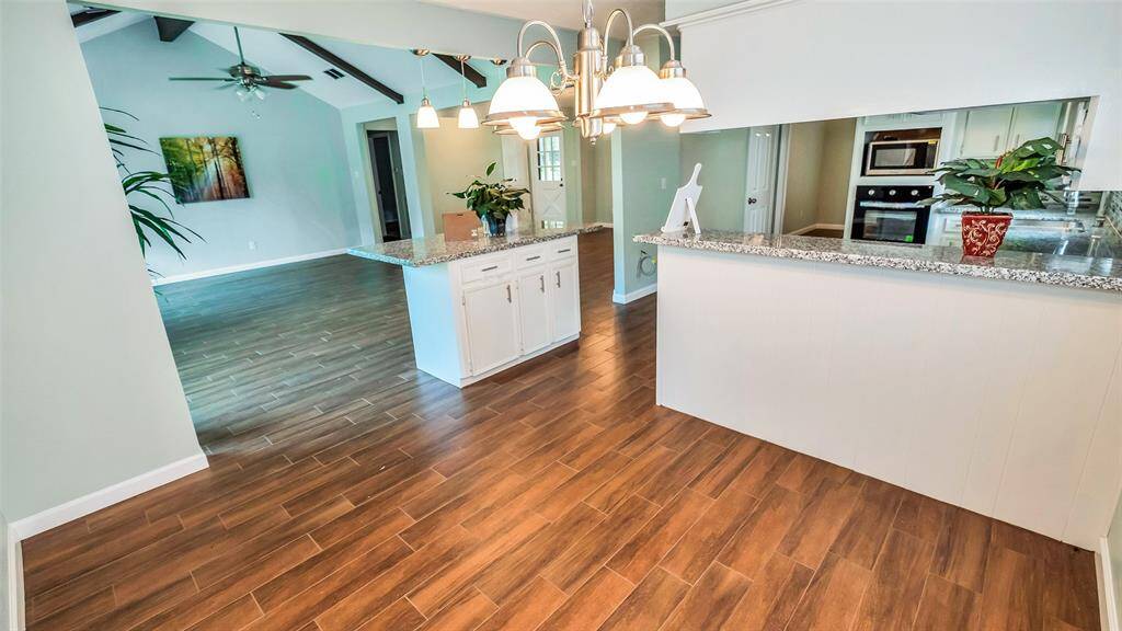 Breakfast area next to Kitchen and Island next.
