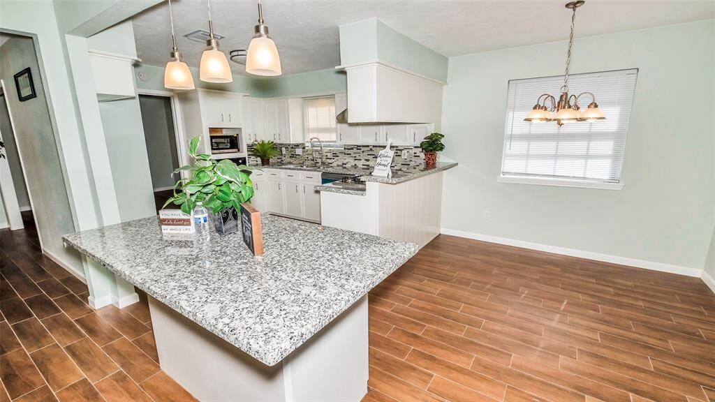 View of Island and Kitchen area.