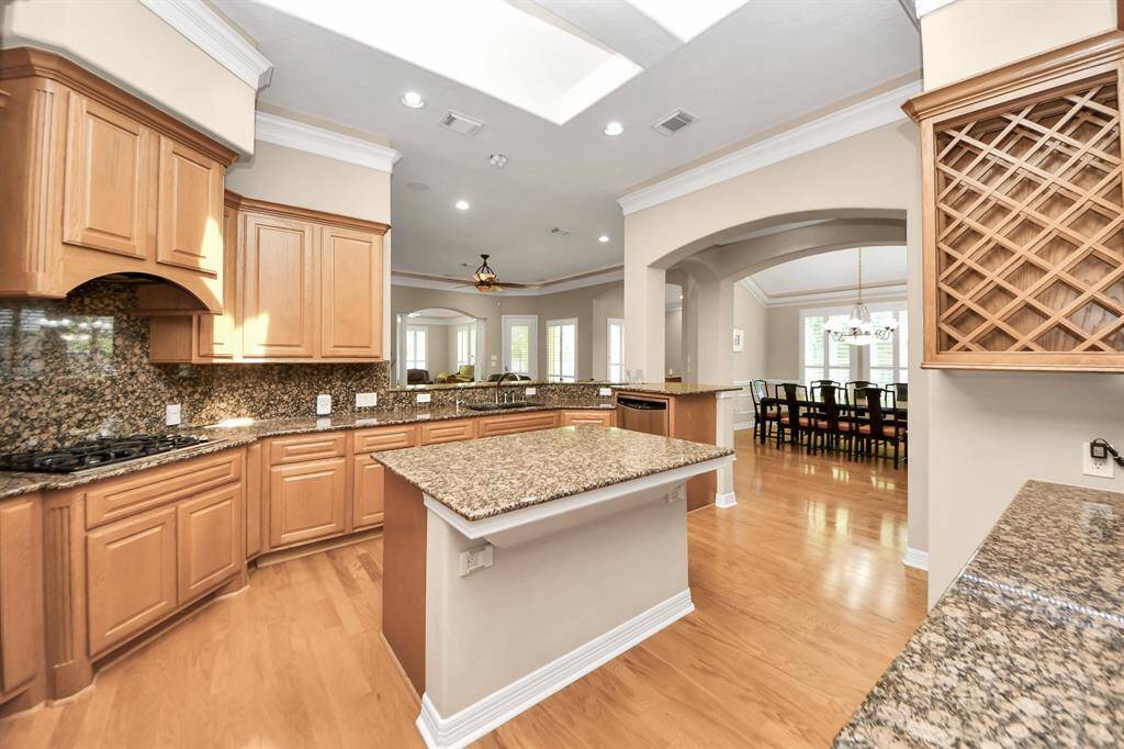 Granite countertops with granite backsplash.