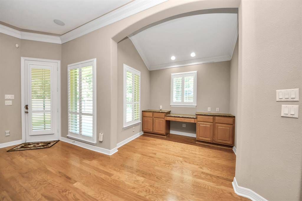 Extra desk area (Office #2) with beautiful Plantation Shutters.