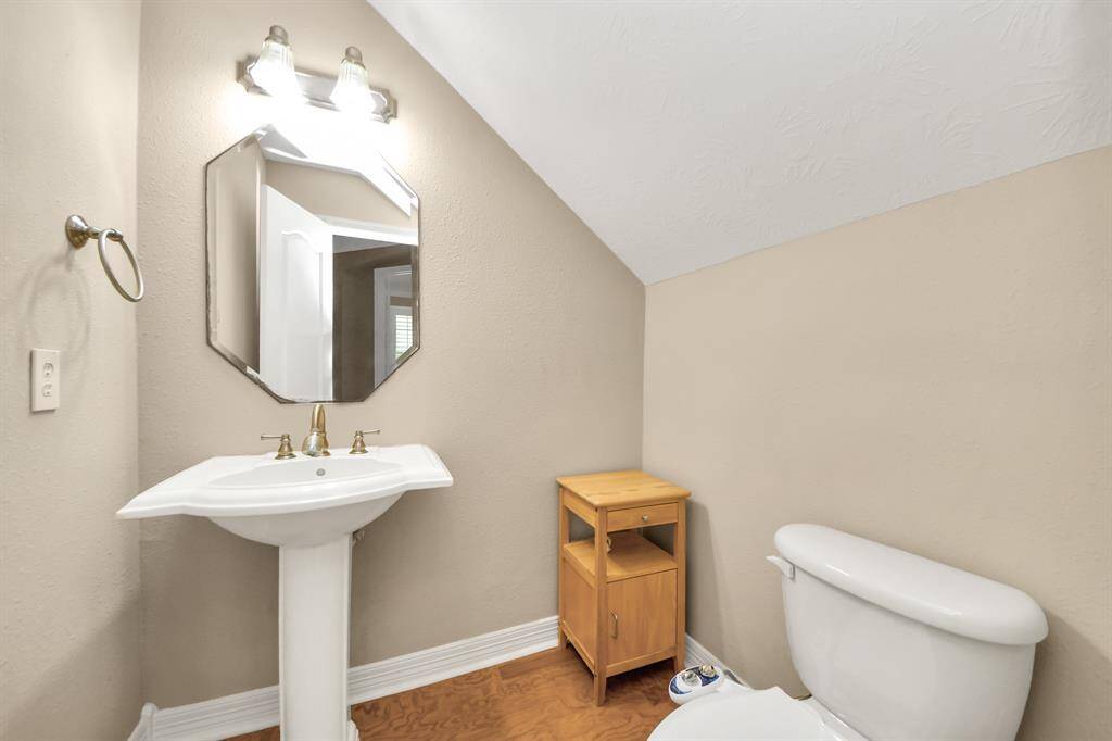 1/2 Bath located by the entrance.