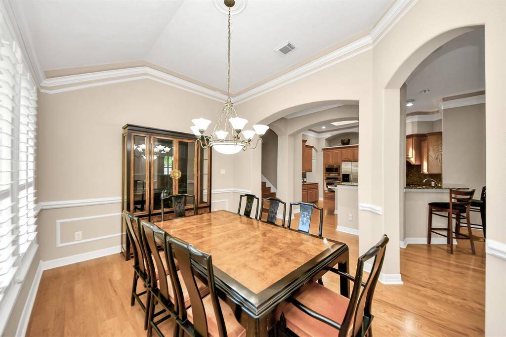 Dining room is off the kitchen and open to the family room.