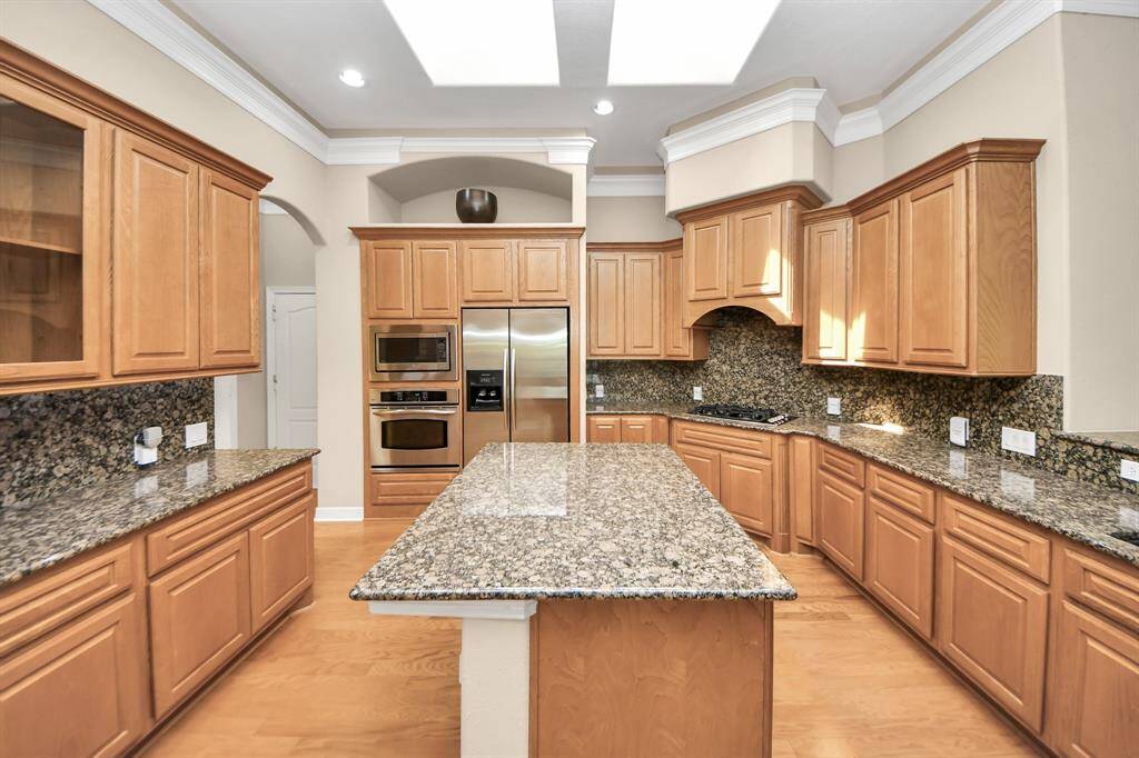 Plenty of cabinets in the kitchen.