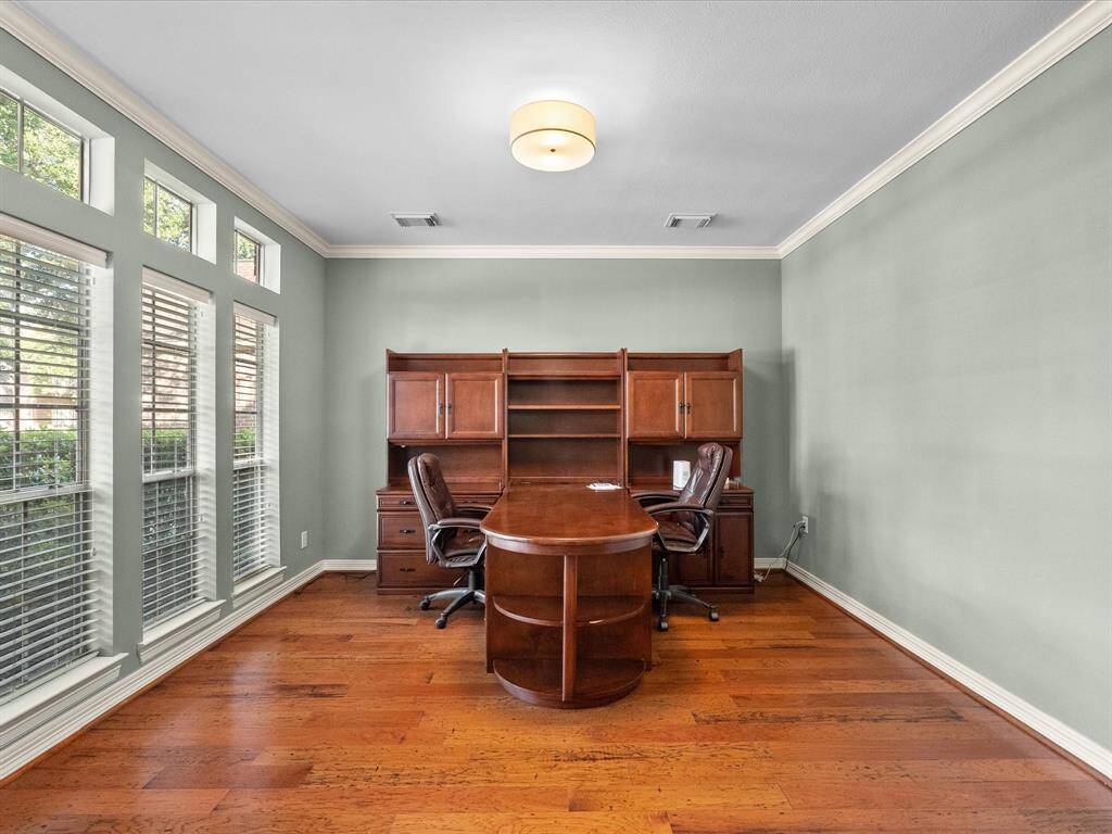 This room is currently being used for an office.  It could be used as a gaming room or living room.