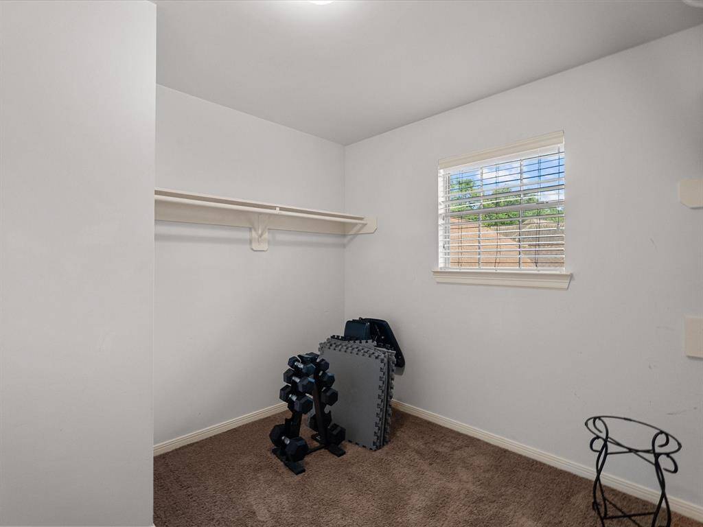 This closet is massive.  It could be used for storage, office, weight room.