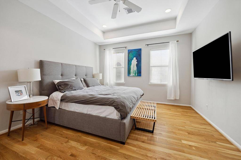 Retreat to your private and relaxing primary bedroom with remarkable tray ceiling