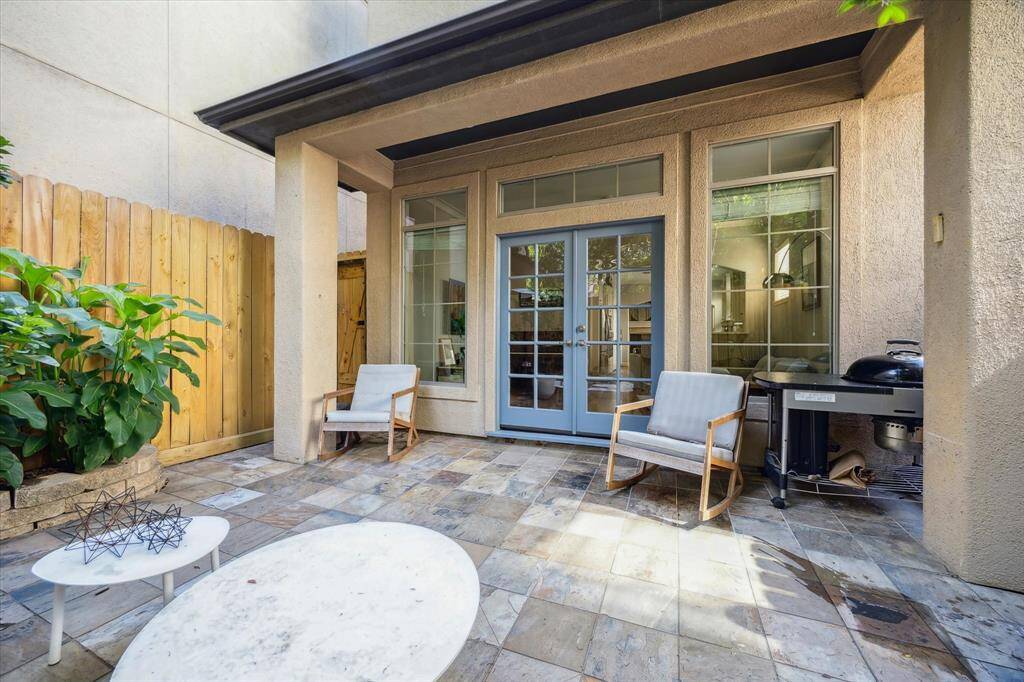 Exit through the stunning French doors onto your back patio and enjoy this space morning, noon, and night