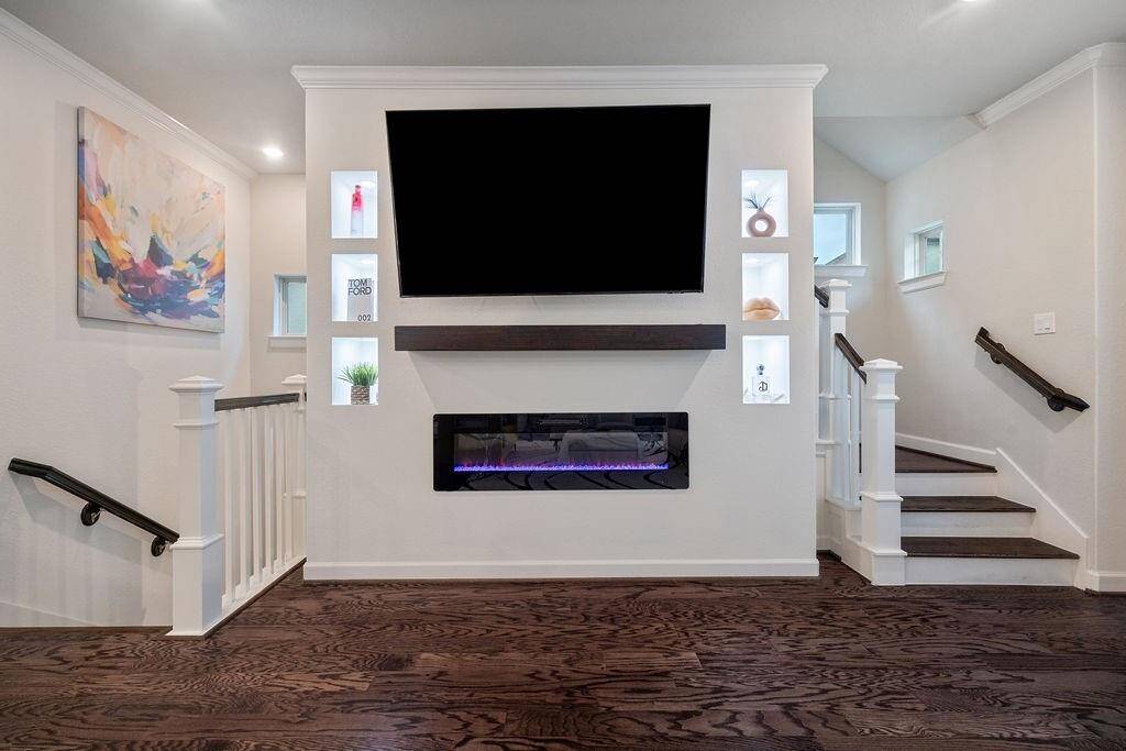 Custom fireplace wall with cutout shelves