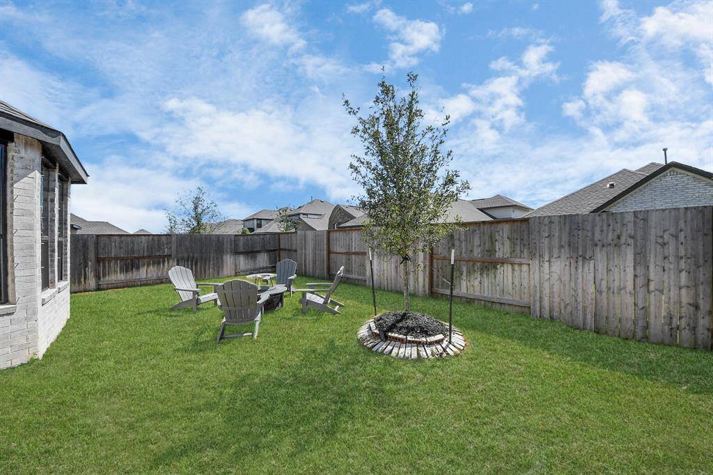 Backyard with endless possibilities to make it home for you.