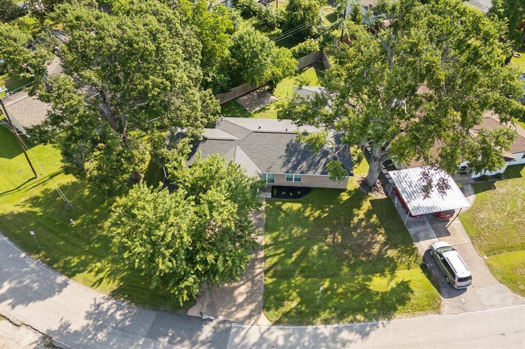 Charming corner-lot home with fresh exterior updates and a spacious 2-car carport.