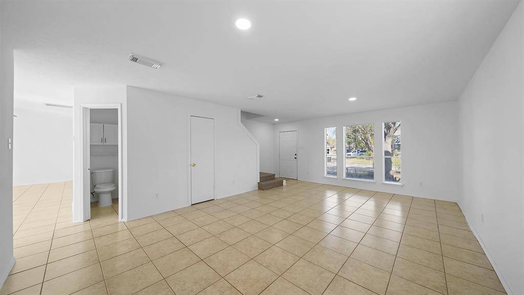 Upon entering, you are greeted with a large living area!