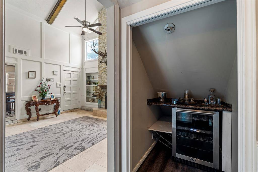 A clever use of space—this under-the-stairs wine bar adds character and convenience, and a freestanding wine fridge.A clever use of space—this under-the-stairs wine bar adds character and convenience, complete with granite counters and built-in wine fridge.
